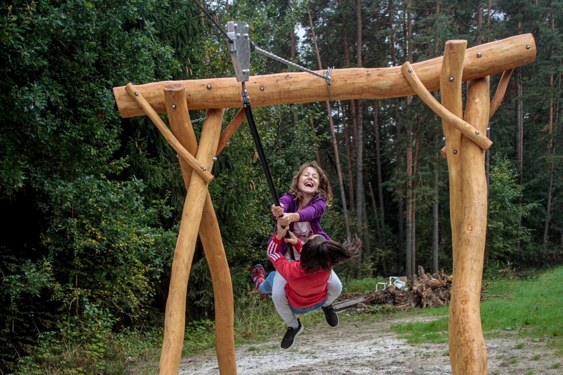 Kids playing on swing
