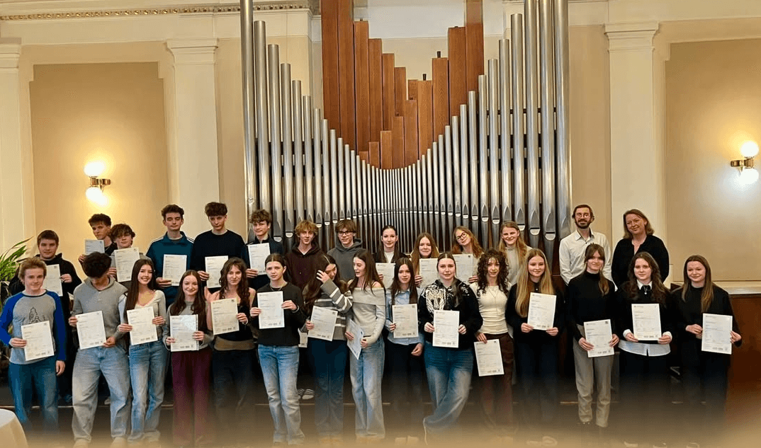 Students receiving Cambridge certificates